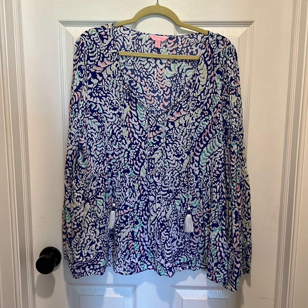 Lily Pulitzer top with bell sleeves and waist.